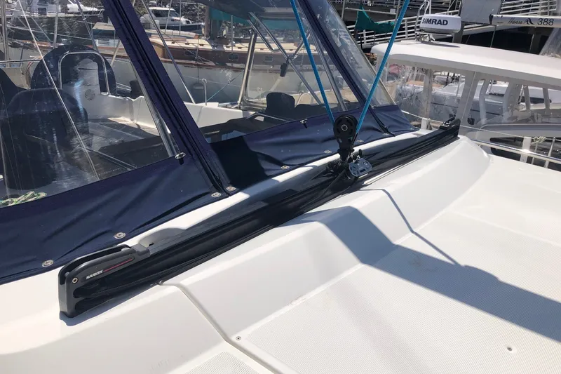 Slide: The Image of 2010 Jeanneau Sun Odyssey 42 DS sailboat deck with blue canvas and rigging. - 25