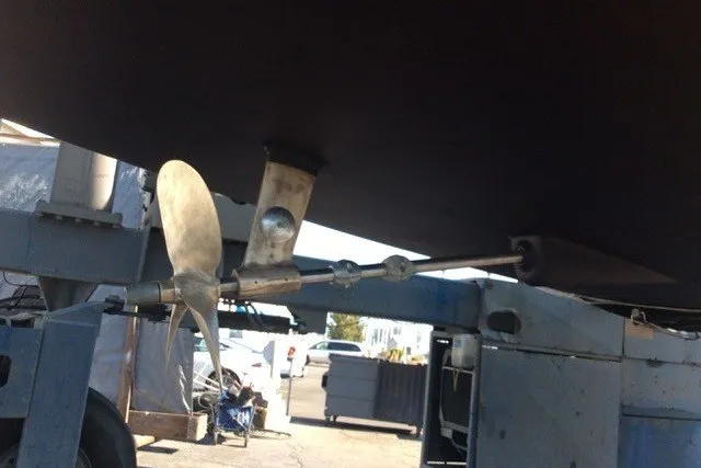 Slide: The Image of Propeller and shaft of 2010 Jeanneau Sun Odyssey 42 DS sailboat in dry dock. - 28