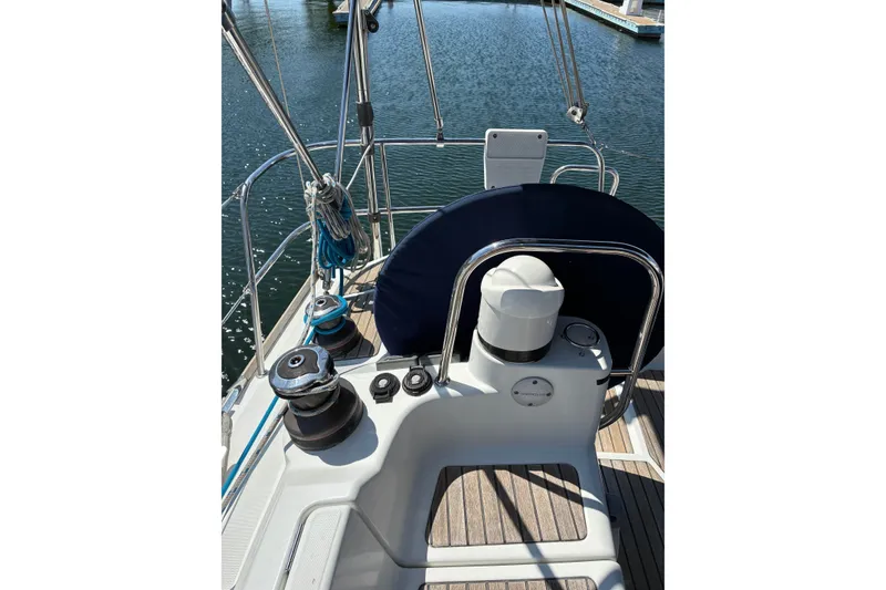 Slide: The Image of Cockpit of 2010 Jeanneau Sun Odyssey 42 DS sailboat with winches and steering wheel. - 16