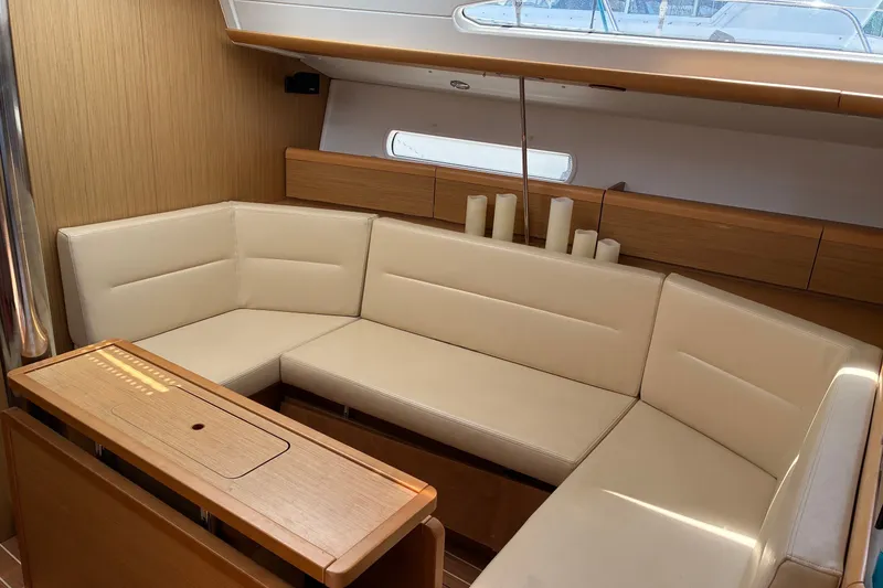 Slide: The Image of Luxurious interior of 2010 Jeanneau Sun Odyssey 42 DS yacht with beige seating. - 4