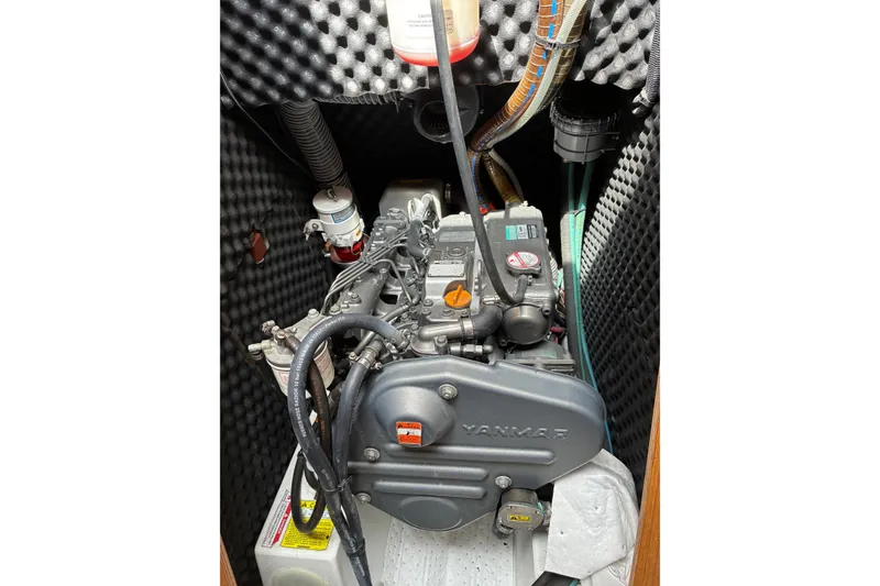 Slide: The Image of Engine compartment of 2010 Jeanneau Sun Odyssey 42 DS sailboat, featuring Yanmar engine. - 12