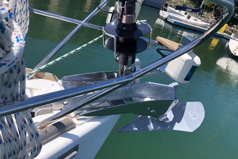 Slide: The Image of Bow of 2010 Jeanneau Sun Odyssey 42 DS with anchor and ropes in marina. - 21