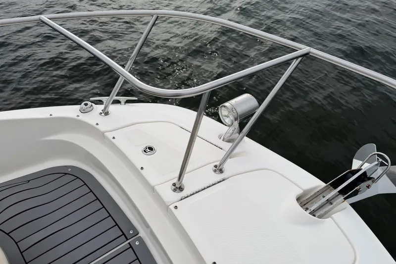 Slide: The Image of Bow of 2020 Sea Ray Sundancer 320 Coupe Outboard with stainless steel railings. - 33