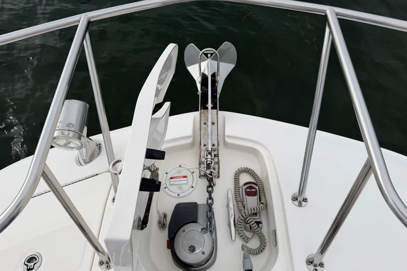 Slide: The Image of Bow anchor system on 2020 Sea Ray Sundancer 320 Coupe Outboard, featuring stainless steel railings. - 34