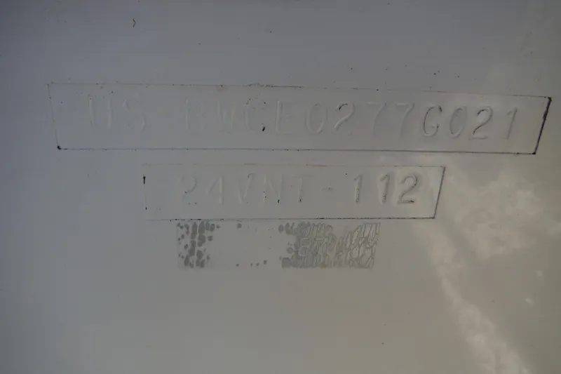 Slide: The Image of Hull identification number on a 2021 Boston Whaler 240 Vantage boat. - 48