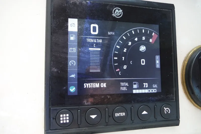 Slide: The Image of Dashboard display of a 2021 Boston Whaler 240 Vantage showing speed and fuel level. - 22