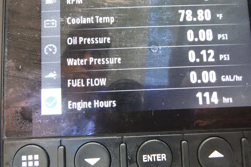 Slide: The Image of Boat dashboard display showing engine metrics for 2021 Boston Whaler 240 Vantage. - 21