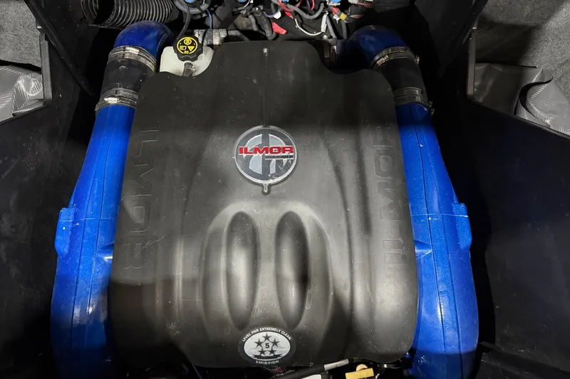 Slide: The Image of Engine of a 2019 MasterCraft X24 boat with Ilmor branding. - 14