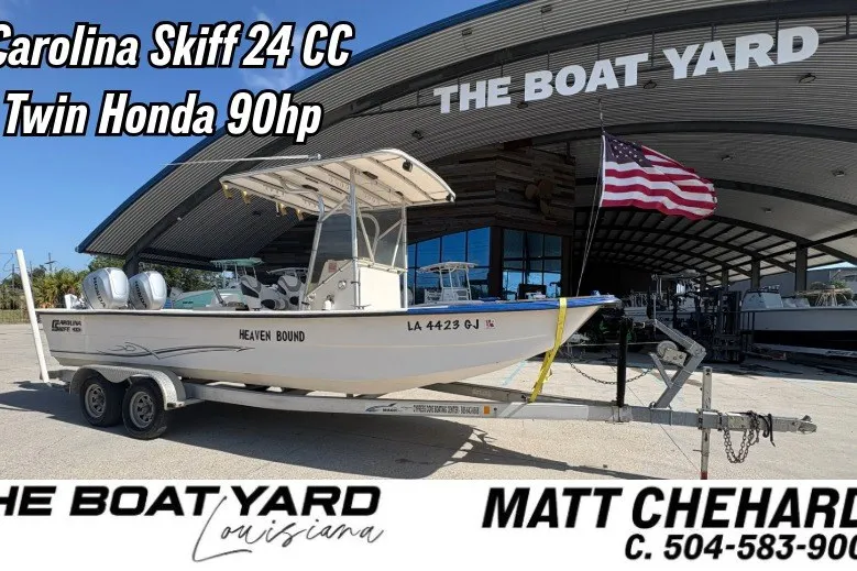 The Image of 2019 Carolina Skiff 24 DLX boat with twin Honda 90hp engines at The Boat Yard. - 1