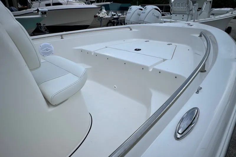 Slide: The Image of 2027 Key West 189 FS boat interior with seating and storage compartments. - 15