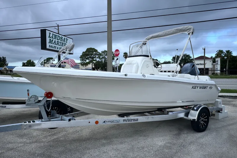 The Image of 2027 Key West 189 FS boat on trailer at Lindsay Marine dealership. - 12