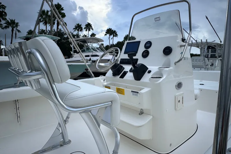 Slide: The Image of 2027 Key West 189 FS boat interior with modern helm and seating. - 17