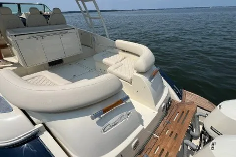 Slide: The Image of 2016 Chris-Craft Launch 36 boat with luxurious seating on calm waters. - 23