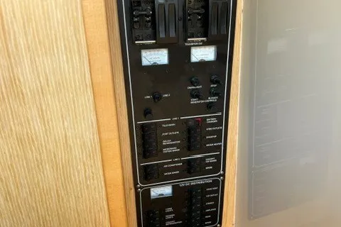 Slide: The Image of 2016 Chris-Craft Launch 36 electrical panel with switches and meters. - 30