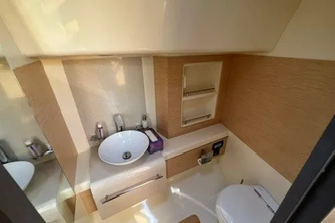 Slide: The Image of 2016 Chris-Craft Launch 36 bathroom with modern sink and toilet. - 28