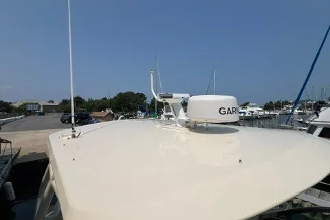 Slide: The Image of 2016 Chris-Craft Launch 36 boat with Garmin radar, docked at a marina. - 25
