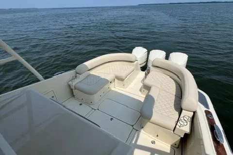 Slide: The Image of 2016 Chris-Craft Launch 36 boat with elegant seating on open water. - 21