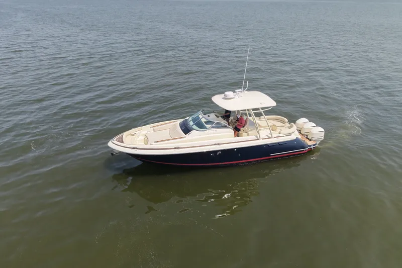 Slide: The Image of 2016 Chris-Craft Launch 36 boat cruising on open water. - 17