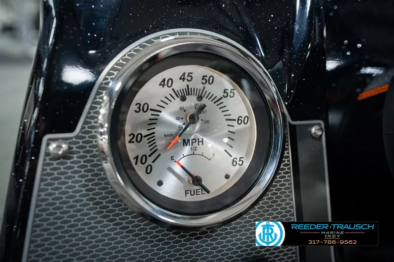 Slide: The Image of Close-up of 2026 Lund 1875 Renegade speedometer and fuel gauge, displaying MPH and fuel levels. - 37