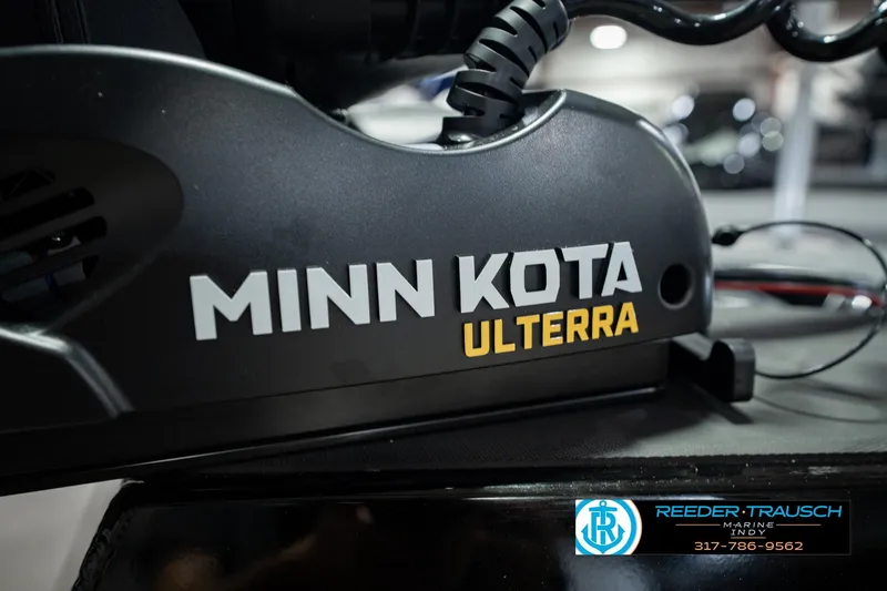 Slide: The Image of Minn Kota Ulterra motor on 2026 Lund 1875 Renegade boat, Reeder-Trausch Marine logo visible. - 56