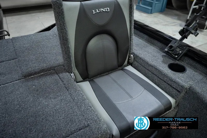 Slide: The Image of 2026 Lund 1875 Renegade boat seat with gray upholstery and Reeder-Trausch Marine logo. - 45