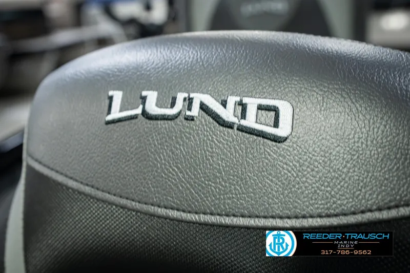 Slide: The Image of 2026 Lund 1875 Renegade boat seat with logo, Reeder-Trausch Marine contact details. - 43