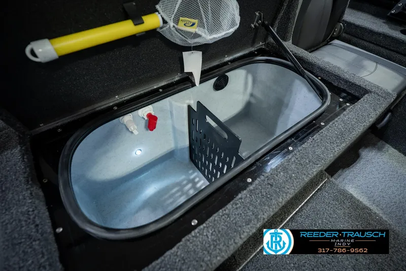 Slide: The Image of 2026 Lund 1875 Renegade boat interior with livewell and fishing net storage. - 48