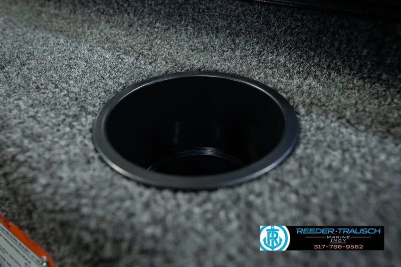 Slide: The Image of Carpeted interior detail of 2026 Lund 1875 Renegade boat with cup holder. - 47