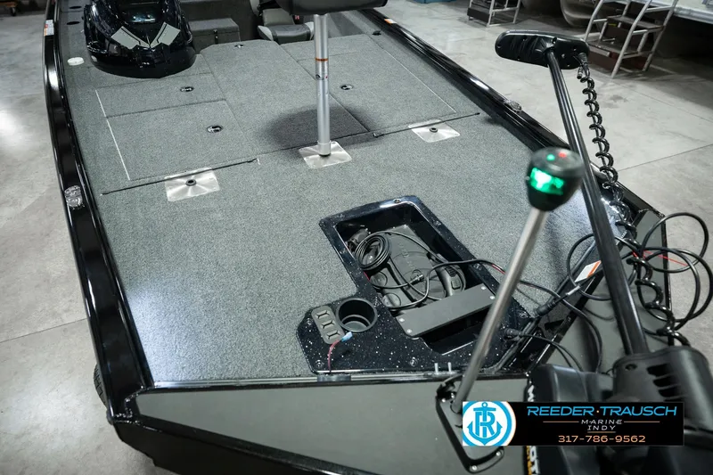 Slide: The Image of 2026 Lund 1875 Renegade boat interior with fishing deck and equipment. - 13