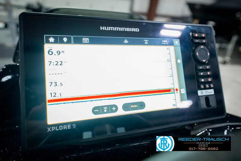 Slide: The Image of Humminbird Xplore 9 fish finder on 2026 Lund 1875 Renegade boat dashboard. - 38