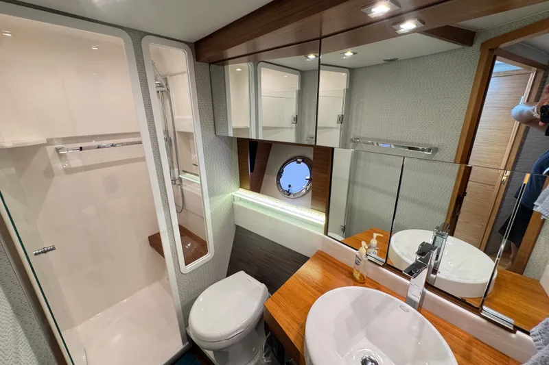 Slide: The Image of Luxurious bathroom in 2021 Tiara Yachts F44 Flybridge, featuring modern fixtures and elegant design. - 29