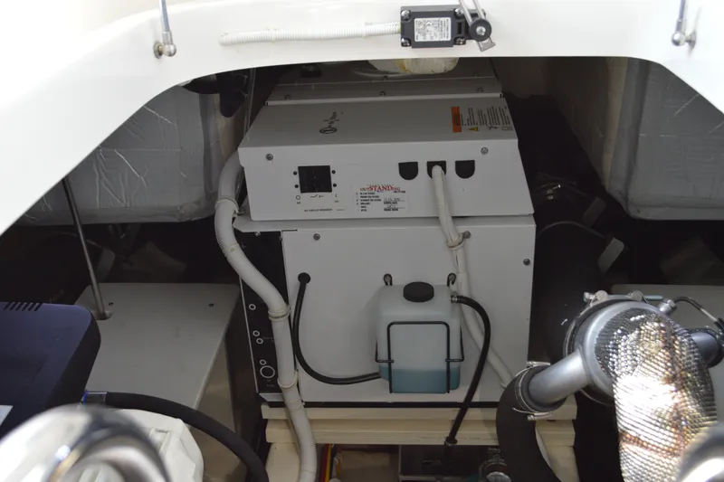Slide: The Image of Engine compartment of 2021 Tiara Yachts F44 Flybridge, showcasing mechanical components. - 56