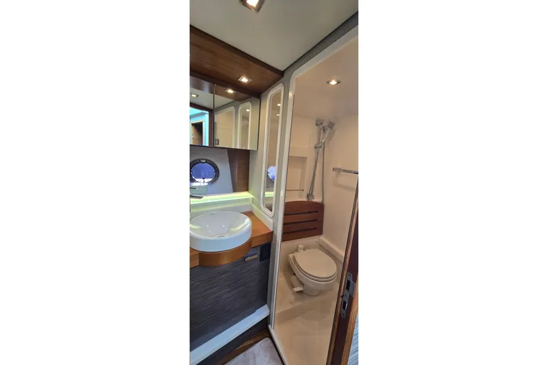 Slide: The Image of Luxurious bathroom in 2021 Tiara Yachts F44 Flybridge with modern fixtures and shower. - 35