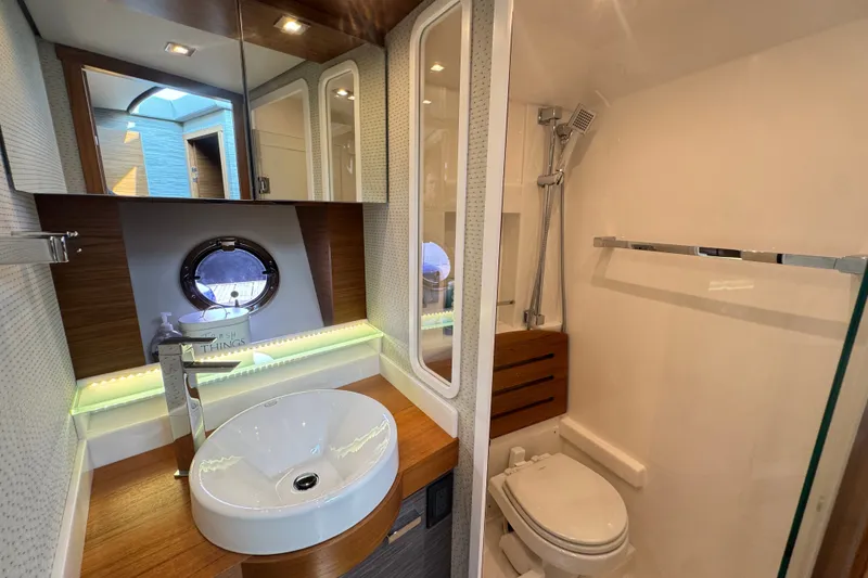 Slide: The Image of Luxurious bathroom in 2021 Tiara Yachts F44 Flybridge with modern fixtures and elegant design. - 34