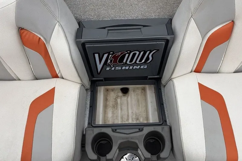 Slide: The Image of 2018 Skeeter FX21 boat interior with Vicious Fishing storage compartment and cup holders. - 29