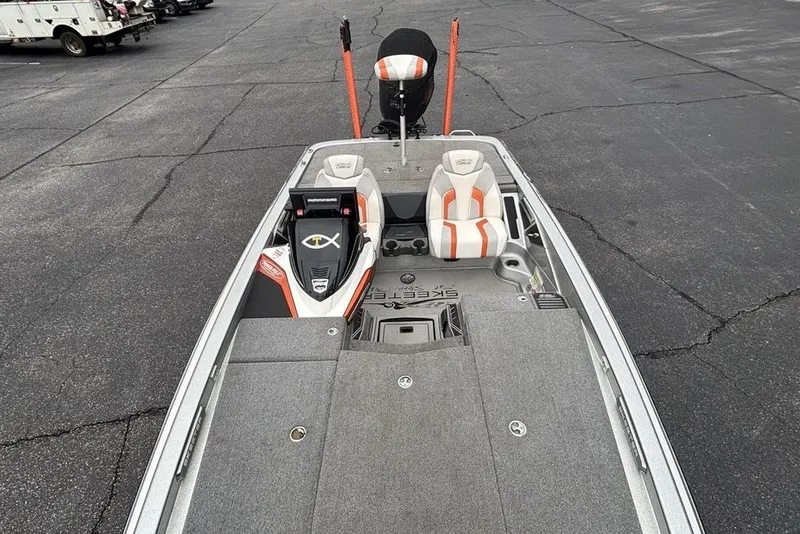 Slide: The Image of 2018 Skeeter FX21 bass boat with dual seats and advanced navigation system. - 36