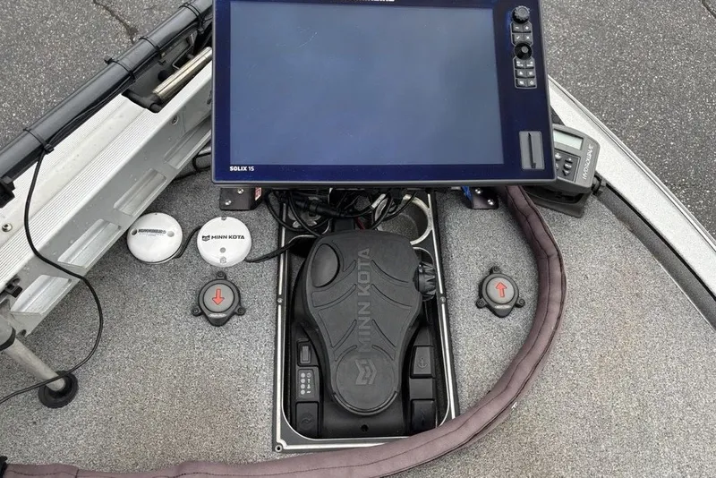 Slide: The Image of 2018 Skeeter FX21 boat dashboard with Minn Kota foot pedal and Solix 15 display. - 20