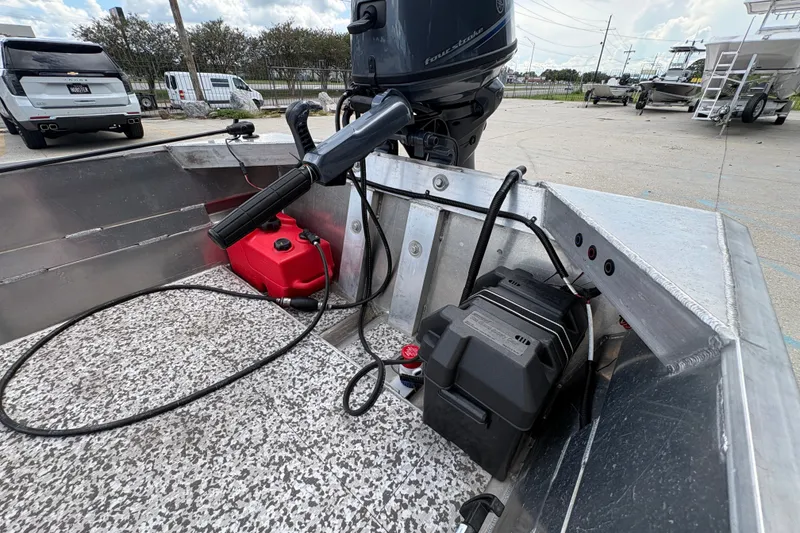 Slide: The Image of Aluminum boat interior with motor, fuel tank, and battery, Custom model 14, 2023. - 14