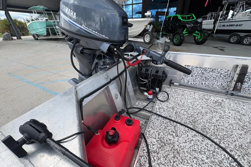 Slide: The Image of Boat with Yamaha four-stroke outboard motor and fuel tank, Custom model 14, 2023. - 13