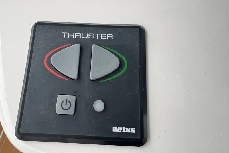 Slide: The Image of Control panel for Vetus thruster on 2022 Intrepid 345 Nomad SE boat. - 13
