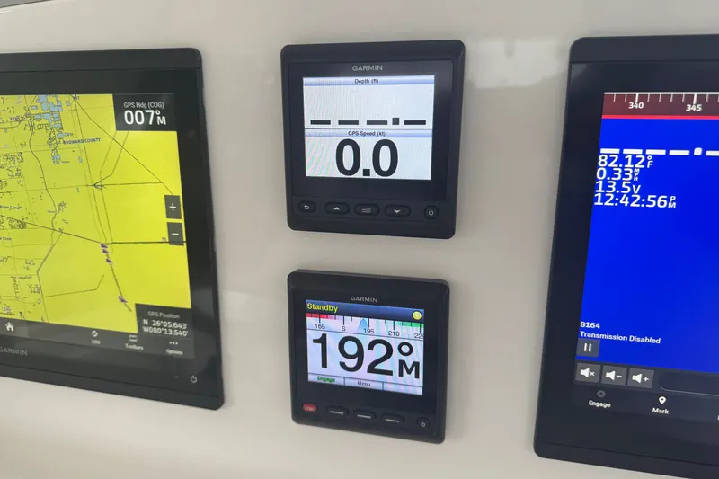 Slide: The Image of Control panel of a 2022 Intrepid 345 Nomad SE with Garmin displays. - 10