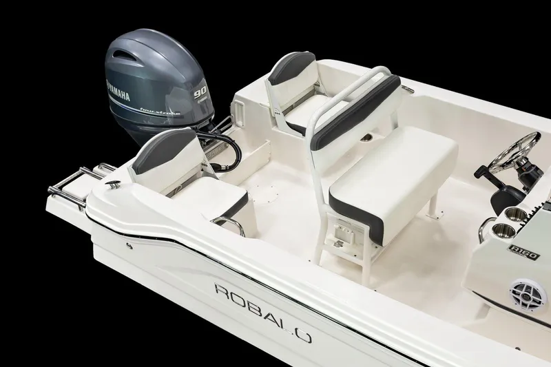 Slide: The Image of Manufacturer Provided Image: 2026 Robalo R160 Center Console boat with Yamaha engine, featuring sleek seating and modern design. - 7