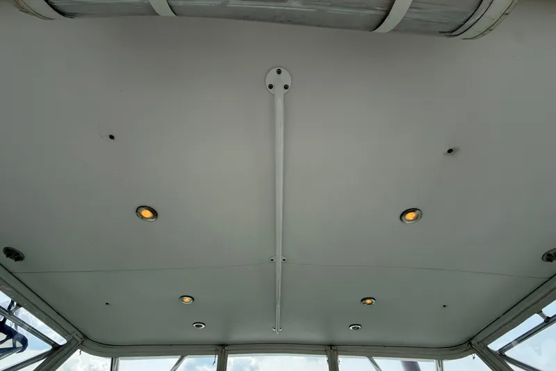 Slide: The Image of Ceiling view of 2007 Cabo 32 Express boat with recessed lighting. - 50