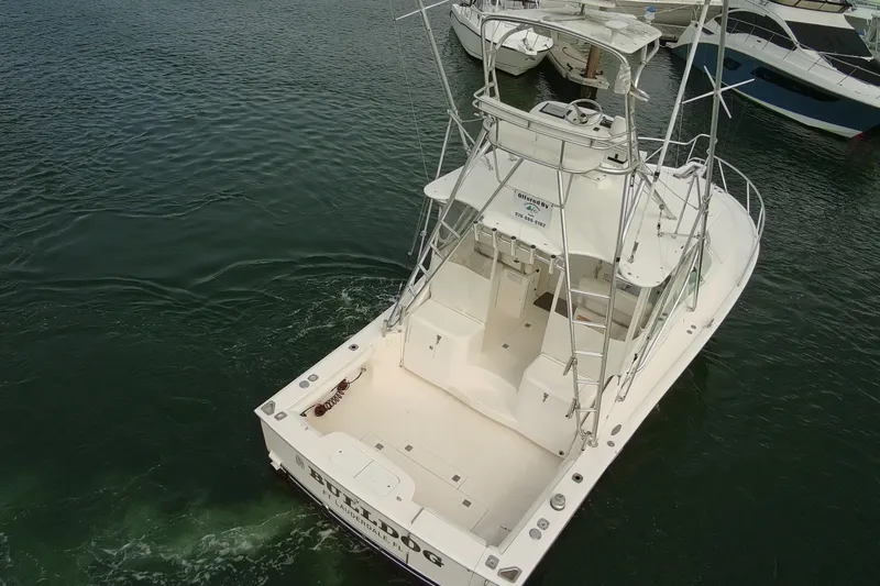 Slide: The Image of 2007 Cabo 32 Express boat docked in marina, aerial view. - 6