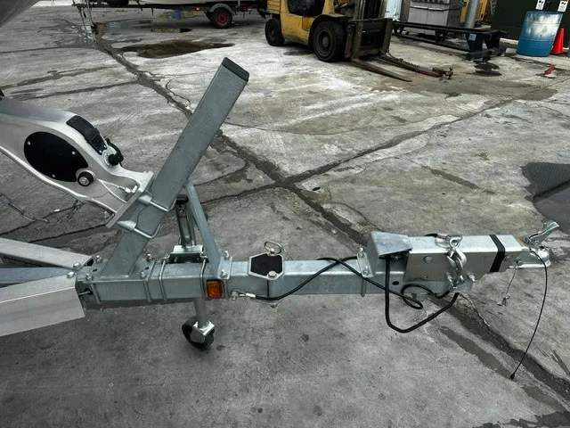 Slide: The Image of Boat trailer with sturdy metal construction on a concrete surface. - 8