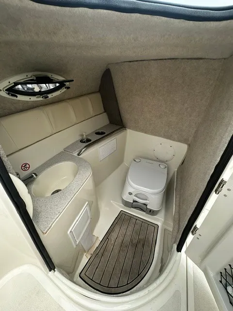 Slide: The Image of Interior of a 2021 Stingray 231 featuring a toilet and sink. - 20