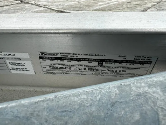 Slide: The Image of Close-up of a boat trailer with manufacturer label and technical details. - 7