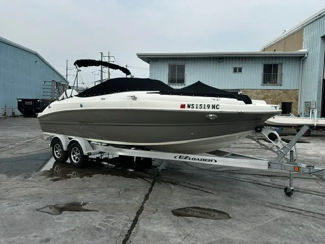 Slide: The Image of 2021 Stingray 231 on a trailer in an industrial area. - 6