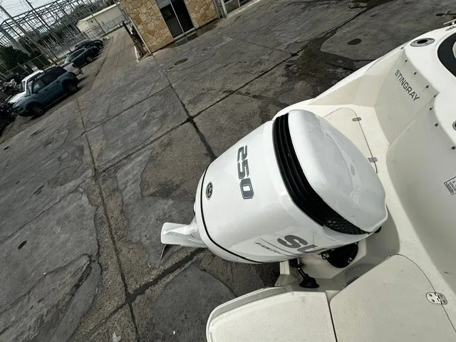 Slide: The Image of A white outboard motor labeled "250" is attached to a boat. - 16