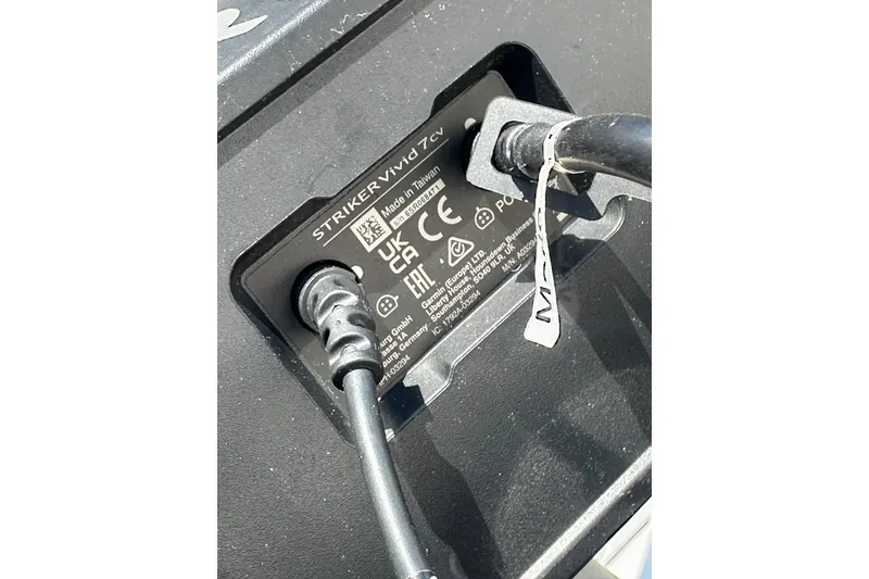 Slide: The Image of Close-up of a Striker Vivid 7cv label with cables connected. - 18